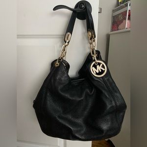 Michael Kors tote with gold accents